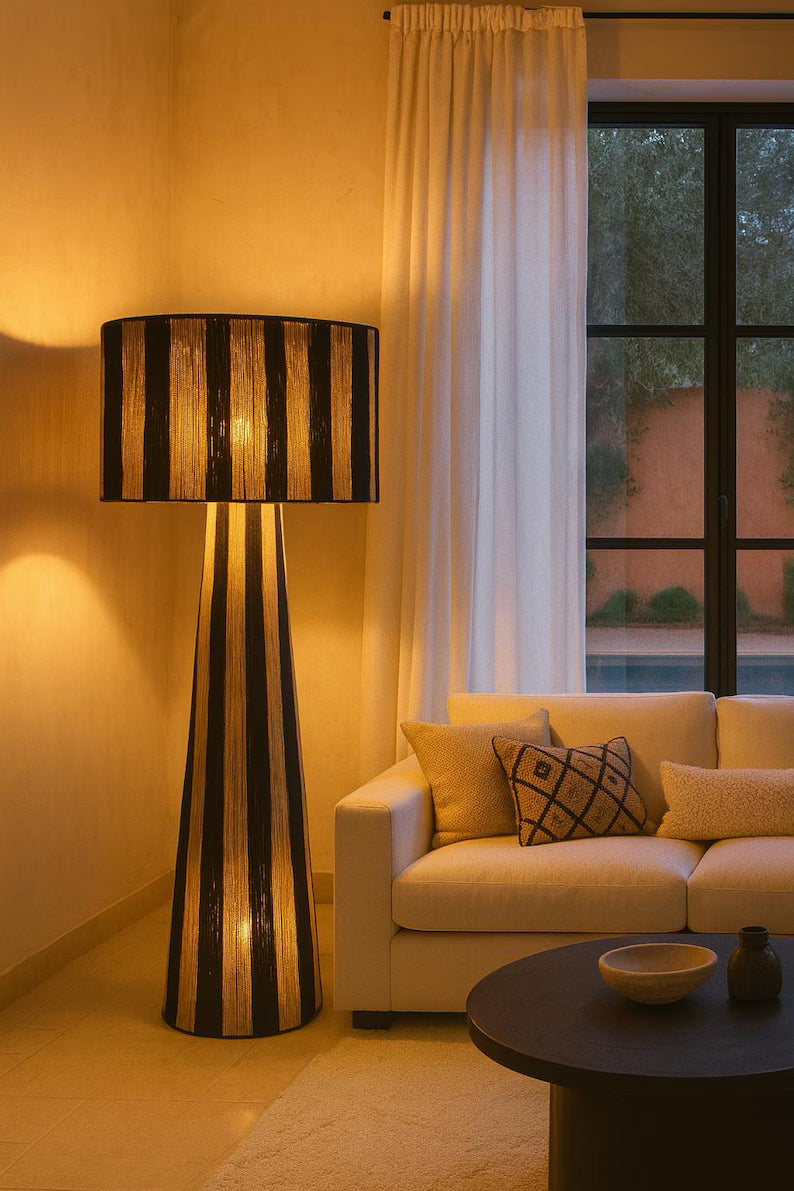 Handmade lamp made from braided rope or raffia
