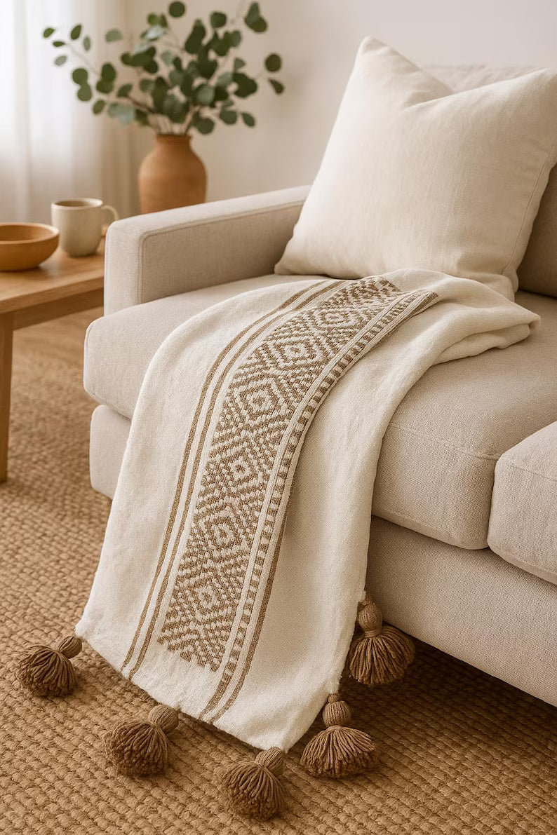 Moroccan boho throw in handwoven cotton with decorative tassels, handmade sofa throw with ethnic patterns