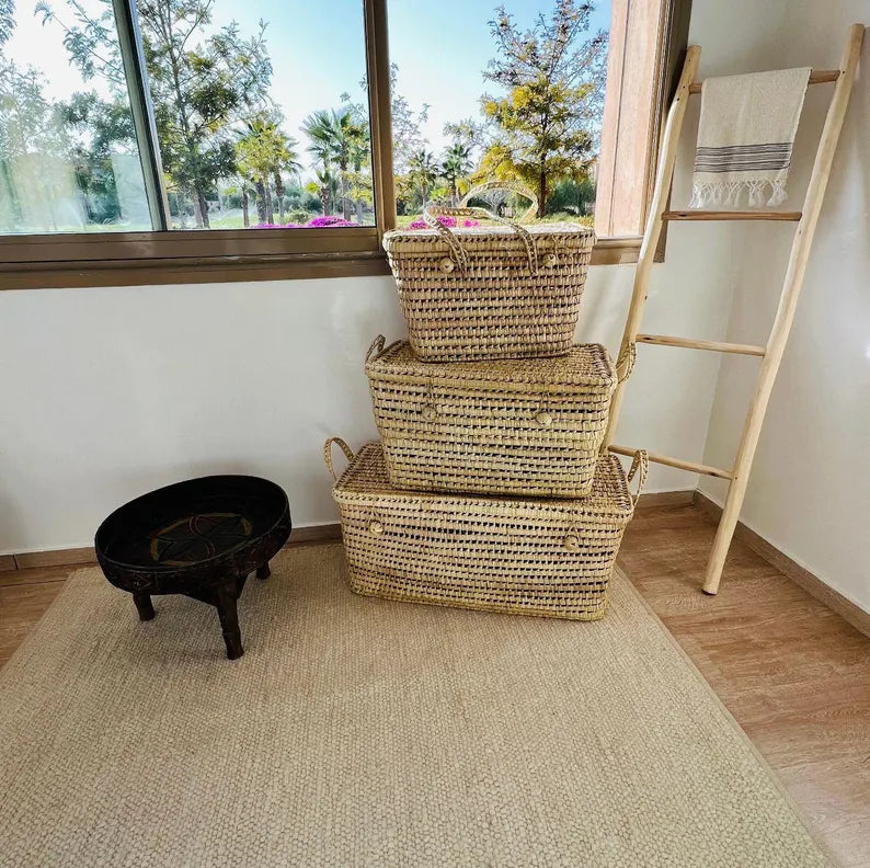 Rectangular woven straw storage trunk with lid and handles, handmade natural artisan basket from Morocco